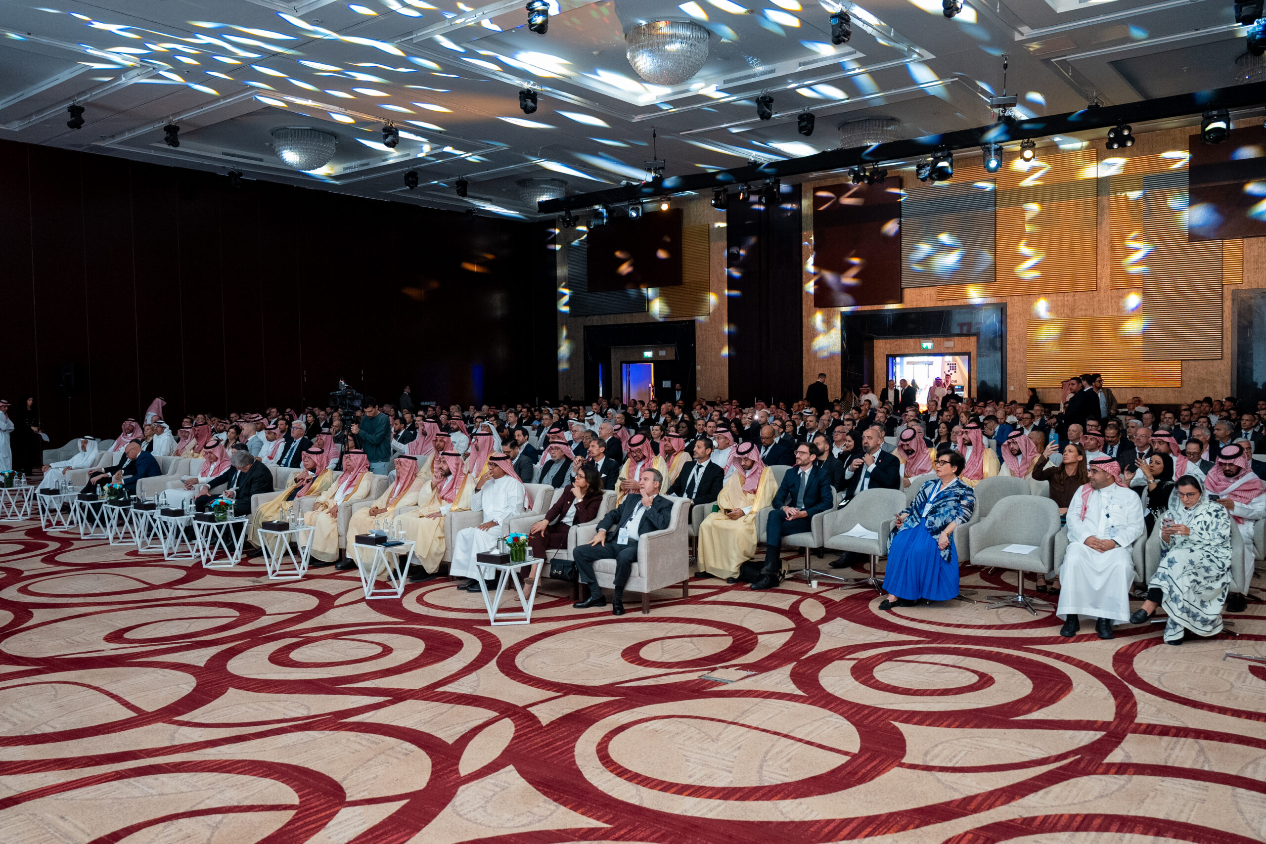 The plenary hall of the French-Saudi Business Forum, full, facing the stage