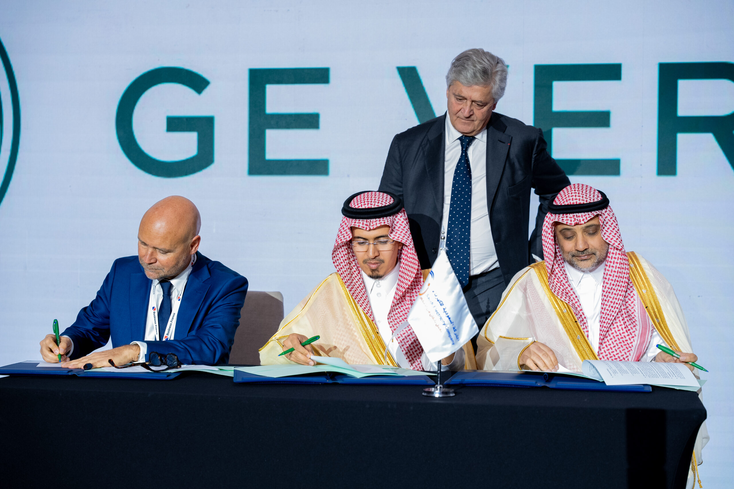 An agreement signed on stage