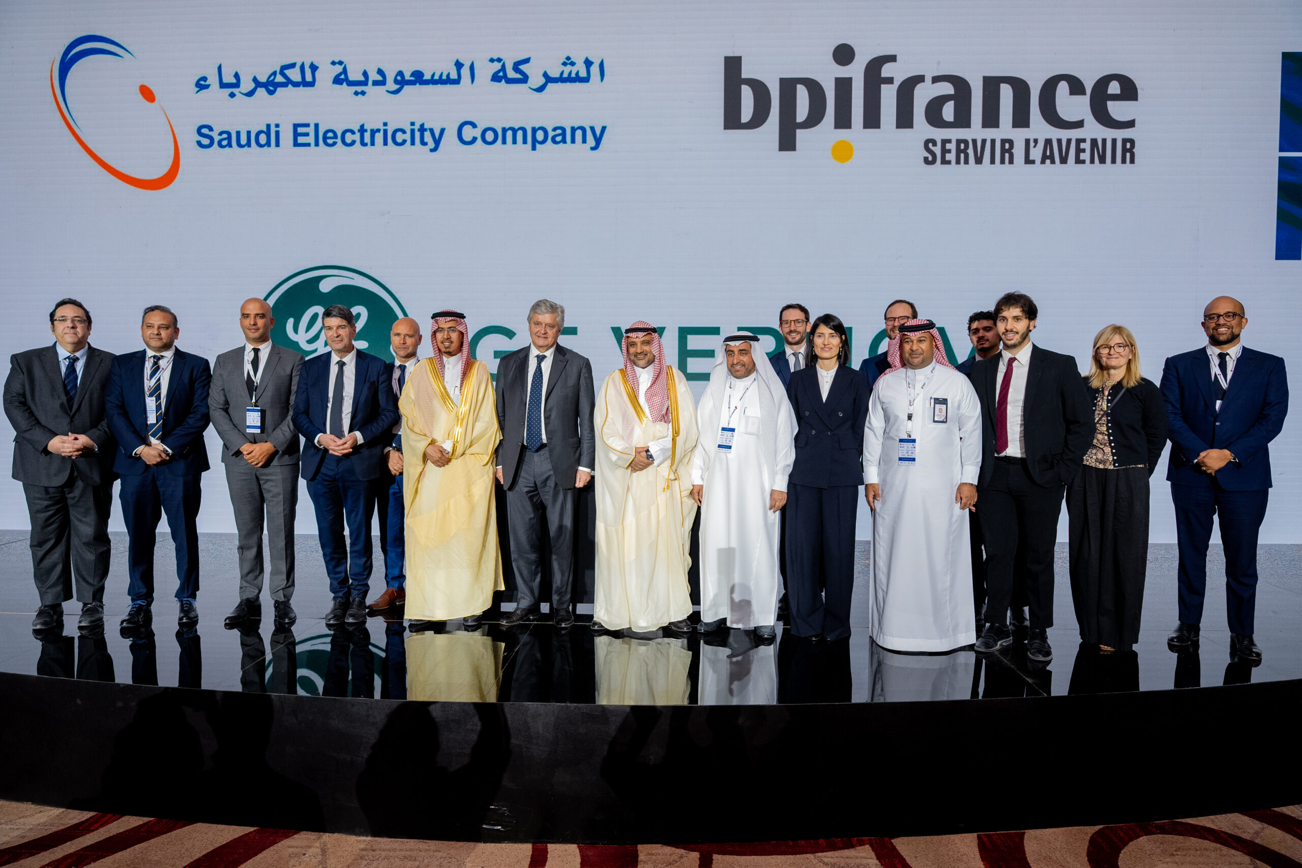 The signing delegations gathered on stage