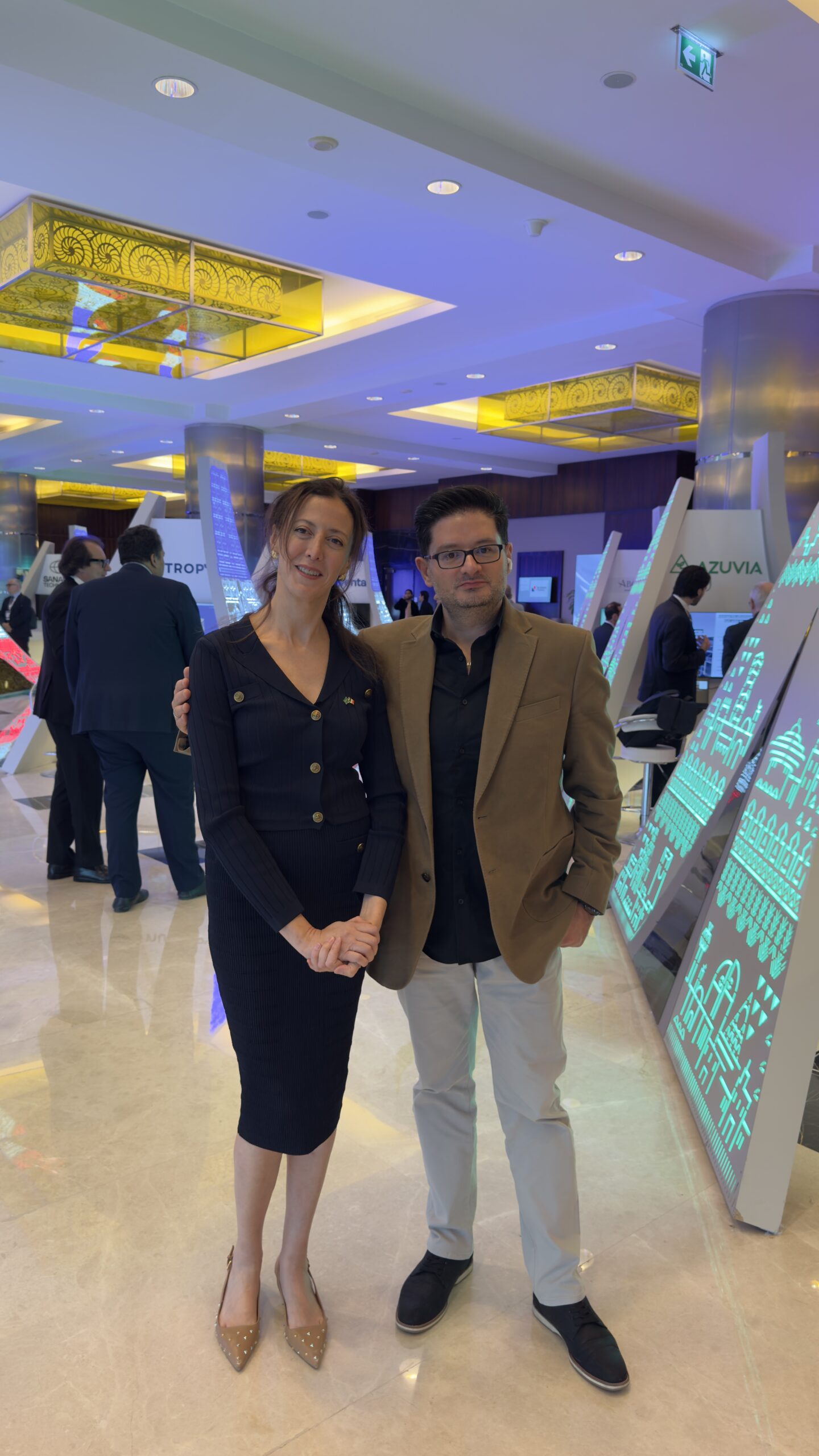 In the foyer of the French-Saudi Business Forum, beside the towers built by the House of Ci